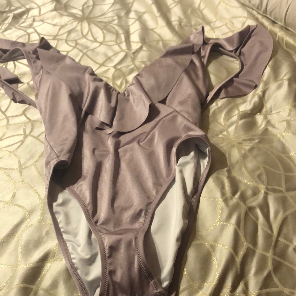 Sexy soft purple lined bathing suit by Victoria Secret!